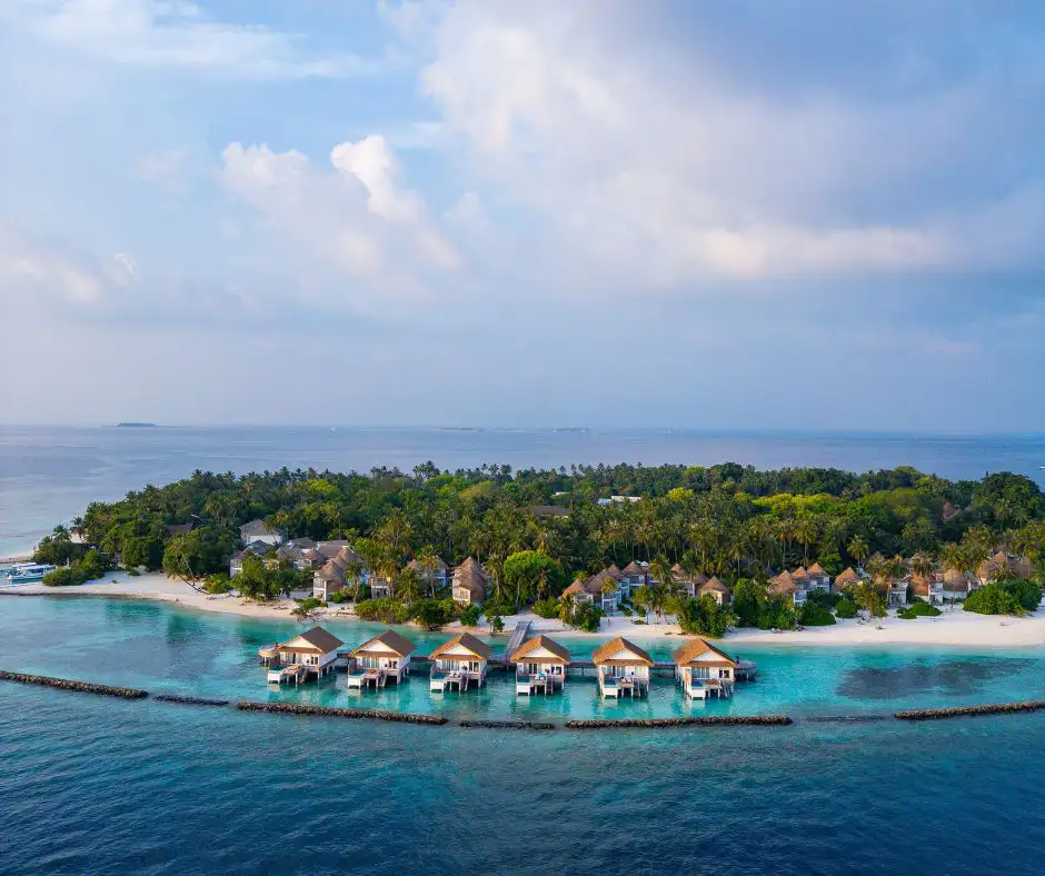 Water villas e laguna al Bandos Resort Maldives